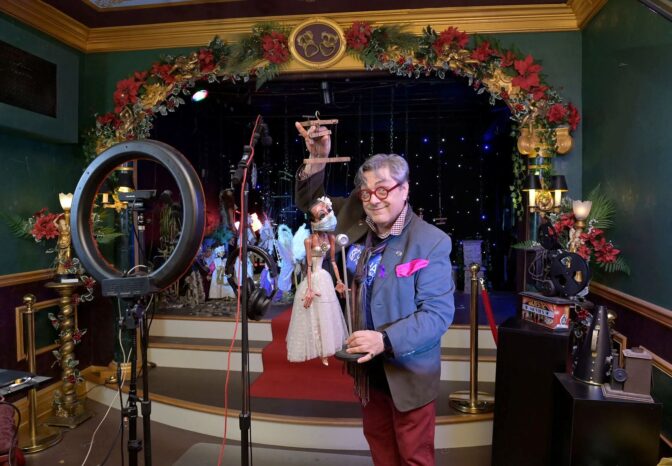 In this 2021 file photo, Robert Brock stands in front of the stage of his Lancaster Marionette Theatre, which had recently closed due to the COVID-19 pandemic. He was converting the theater into a studio for his fledgling YouTube channel. Brock attended the "Witness" premiere at the Fulton Opera House in 1985.