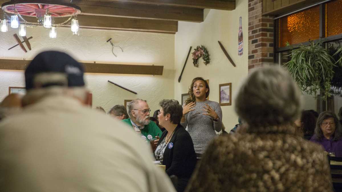 Hazel Diaz discusses Election day logistics at a meeting with volunteers for the Lebanon Democratic Committee at Hoss's Restaurant. (Lindsay Lazarski/WHYY)