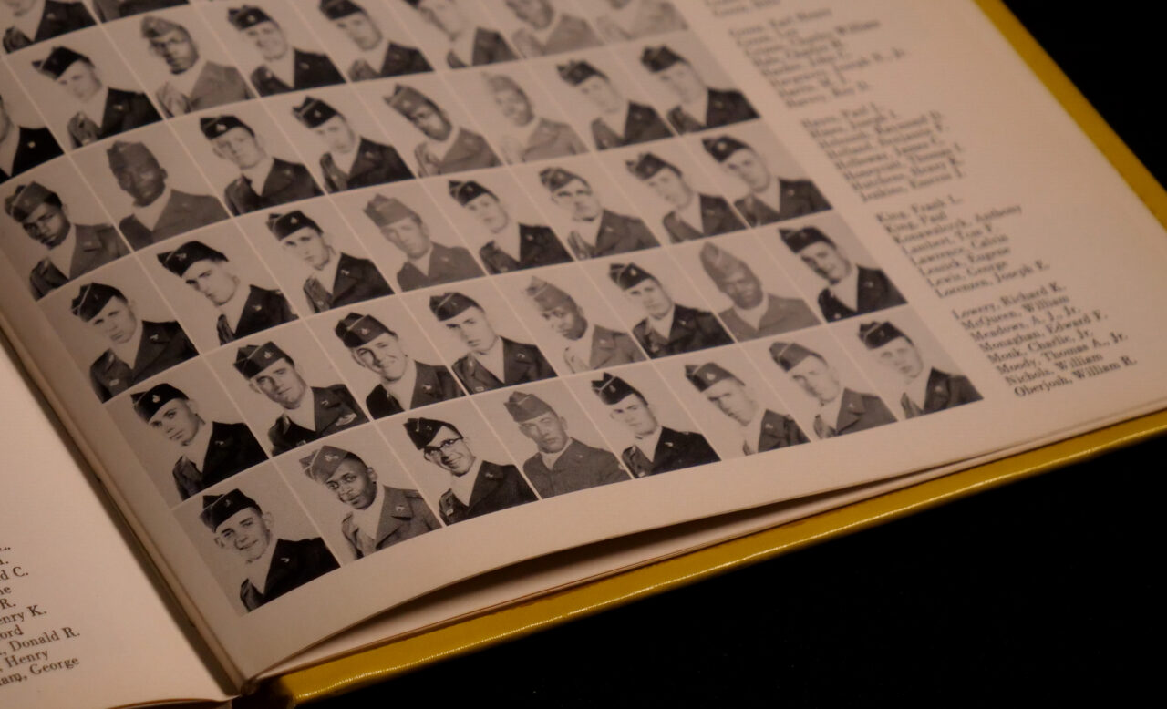 Tom Lambert, second row from the bottom, fourth from the left, pictured in his unit's yearbook. (Jeremy Long - WITF)